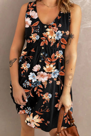 Floral printed sleeveless buttoned magic dress in black, featuring a scoop neck and pockets, perfect for chic summer outings.