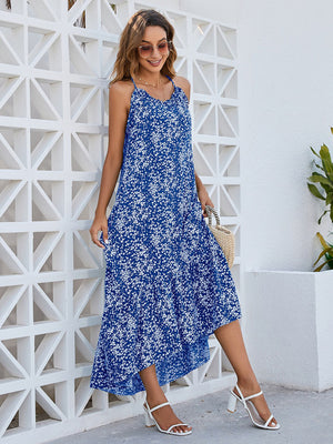 Ditsy floral scoop neck midi cami dress in blue, styled with sandals, perfect for summer outings.