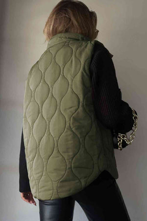 Back view of a collared olive green quilted vest, featuring a stylish design and cozy silhouette.
