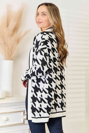 Model wearing a stylish houndstooth open-front longline cardigan, showcasing its elegant design and relaxed fit.