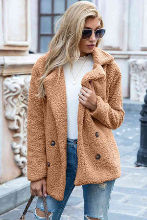 Casual full-size lapel collar sherpa coat in tan, featuring double-breasted closure and stylish sunglasses.