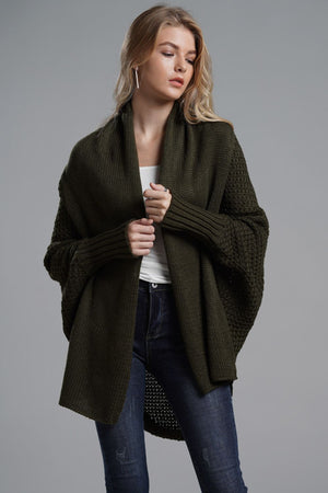 Model wearing a Double Take Dolman Sleeve Open Front Ribbed Trim Longline Cardigan in dark green, styled casually with jeans.