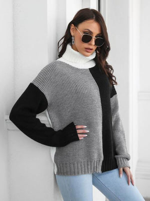 Contrast turtleneck long sleeve sweater in gray and black on model, featuring a basic style with moderate stretch.
