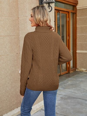 Woman wearing a cable-knit mock neck sweater in brown, showcasing a cozy back view, perfect for fall styling.