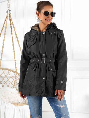 Stylish black hooded jacket with detachable liner, featuring a belted waist and side pockets.