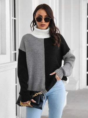 Contrast turtleneck long sleeve sweater in black and gray, styled with sunglasses and denim, perfect for casual outfits.