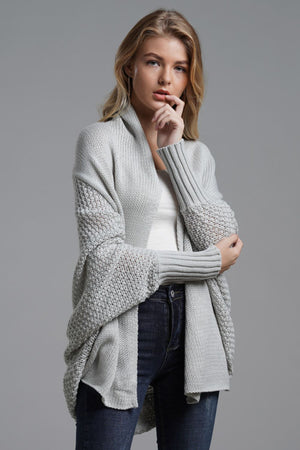 Model showcasing a Double Take Dolman Sleeve Open Front Ribbed Trim Longline Cardigan in soft grey.
