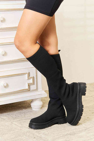 WILD DIVA Knee High Platform Sock Boots featuring a snug fit and stylish sole, perfect for elevating any outfit.