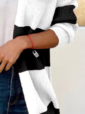 Model showcasing a contrast open front long sleeve cardigan in black and white stripes, perfect for stylish layering.