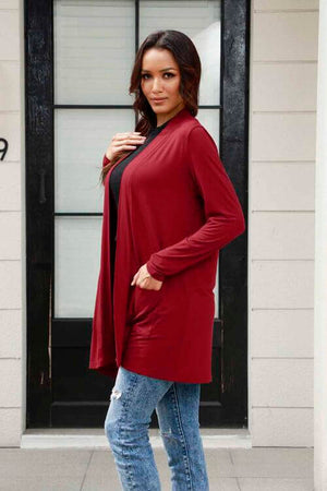 Basic Bae long sleeve cardigan in maroon with pockets worn by model, perfect for layering in any season.
