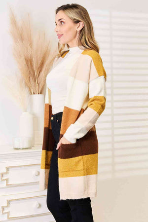 Model showcases the Woven Right Color Block Dropped Shoulder Cardigan in warm tones, perfect for a stylish and cozy look.