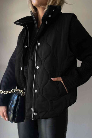 Stylish collared neck vest with pockets, featuring a quilted design and layered look, paired with a chic black handbag.