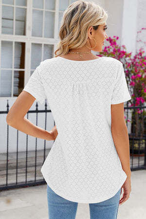 Back view of Eyelet Quarter Button Short Sleeve T-Shirt in white, showcasing its sheer eyelet design and relaxed fit.