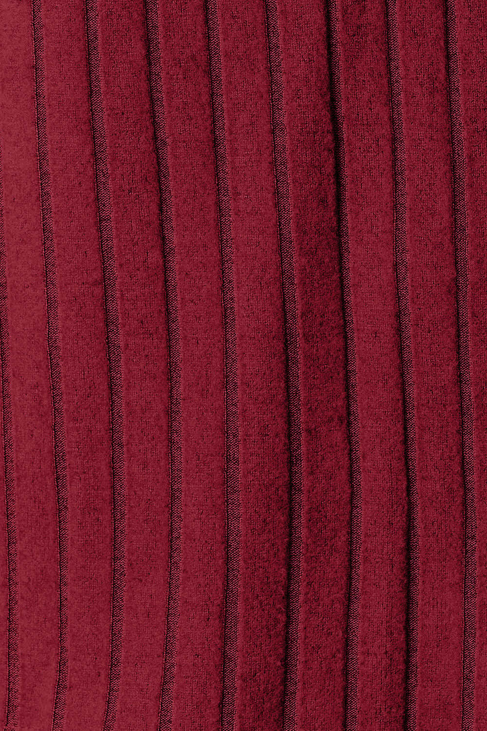 Close-up of ribbed fabric in rich burgundy, showcasing a textured design with vertical stripes.