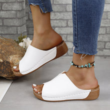 Stylish PU leather open toe sandals with low heel, perfect for summer wear. Comfortable and trendy footwear option.