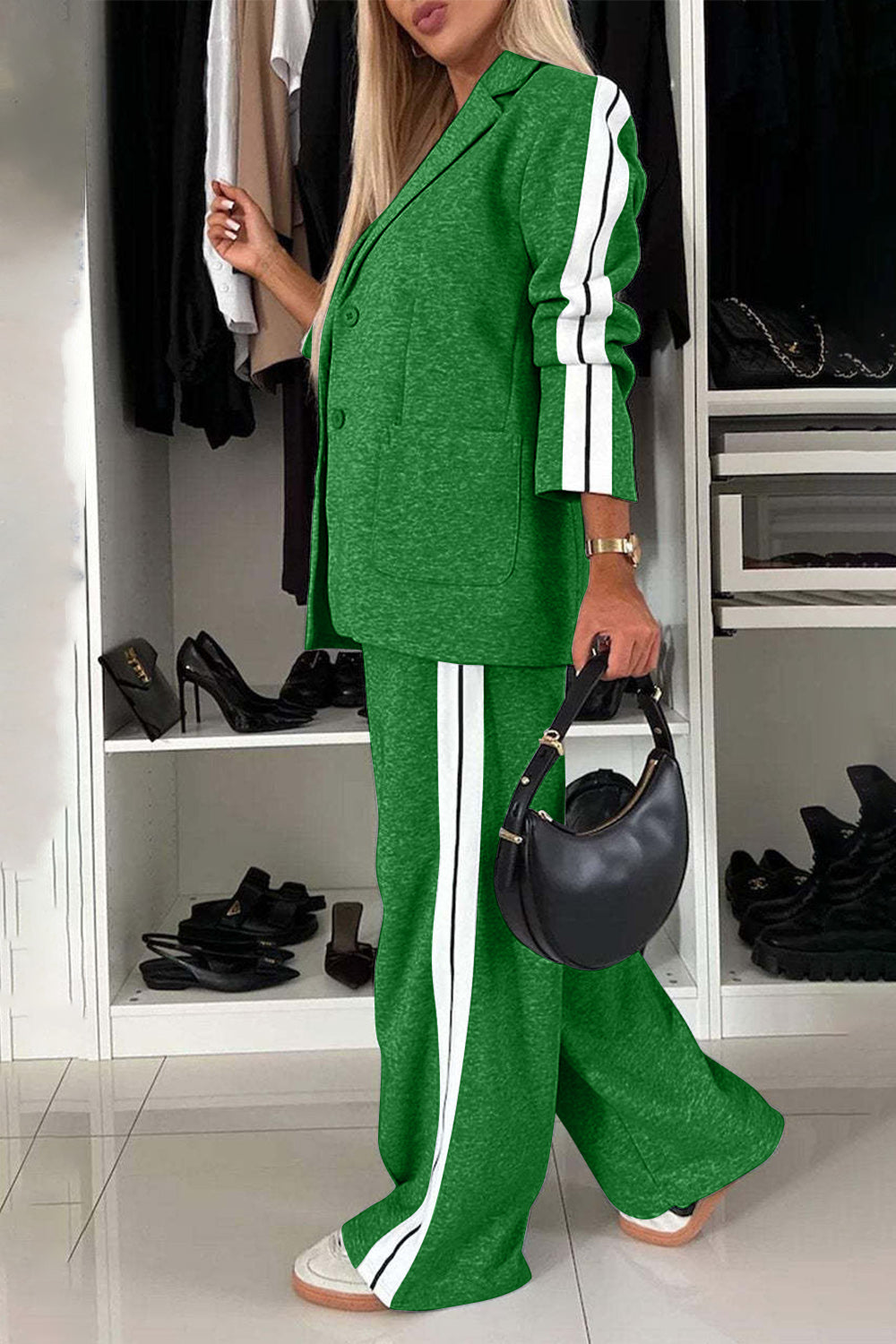 Stylish green lapel collar top and pants set with white stripes, perfect for a chic, casual look.
