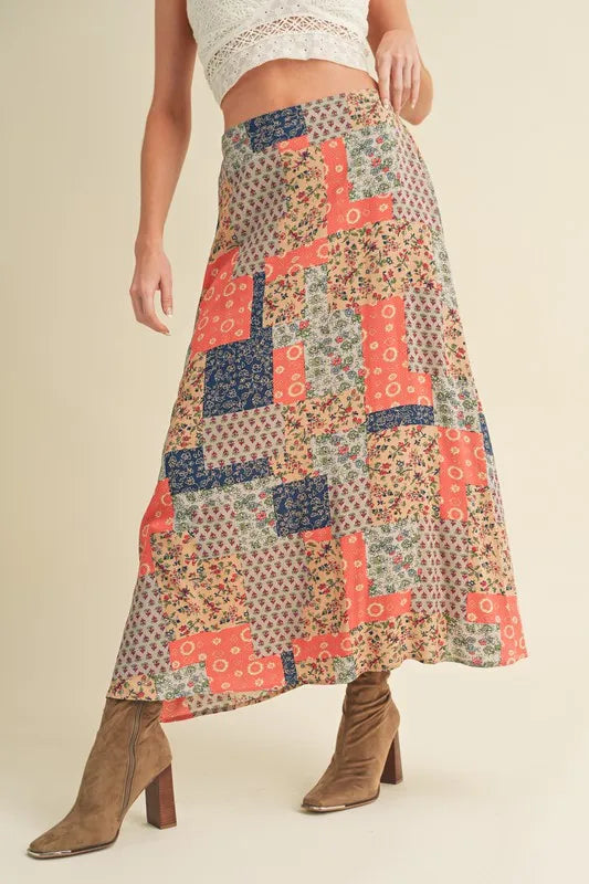 Aemi + Co Printed Maxi Skirt with colorful patchwork design, perfect for stylish summer outfits.
