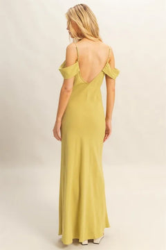 Back view of a woman wearing the HYFVE Flattering Fit Cami Maxi Dress in a chic yellow shade.