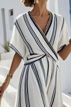 Striped Wrap Half Sleeve Maxi Dress shown on model, showcasing elegant stripes and flattering wrap style.