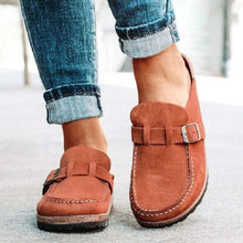 Stylish round toe low heel buckle loafers in rust color, perfect for casual wear and comfort with denim jeans.