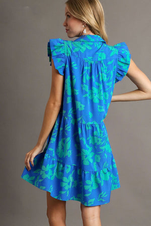 Umgee plus size floral ruffle tiered dress in blue and green, showcasing cap sleeves and a flowy design.