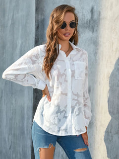 Full Size Collared Neck Long Sleeve Shirt Plus Size in sheer white with pockets, styled casually with sunglasses.