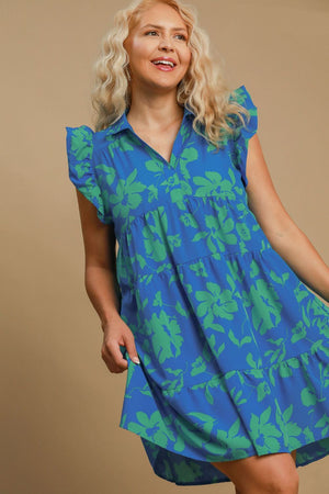 Umgee Plus Size Floral Ruffle Tiered Dress in blue with green floral print, featuring cap sleeves and a flowy silhouette.