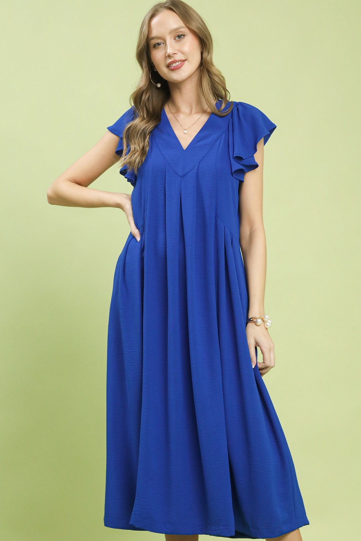 Umgee Ruffle Sleeve V-Neck Midi Dress in royal blue with ruffle cap sleeves and pockets.