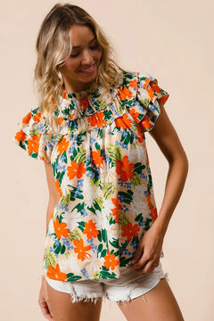 BiBi Multi Color Floral Print Woven Top features a vibrant floral design perfect for summer outfits.