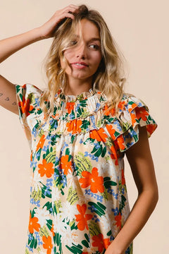BiBi Multi Color Floral Print Woven Top featuring vibrant floral print and frill details.