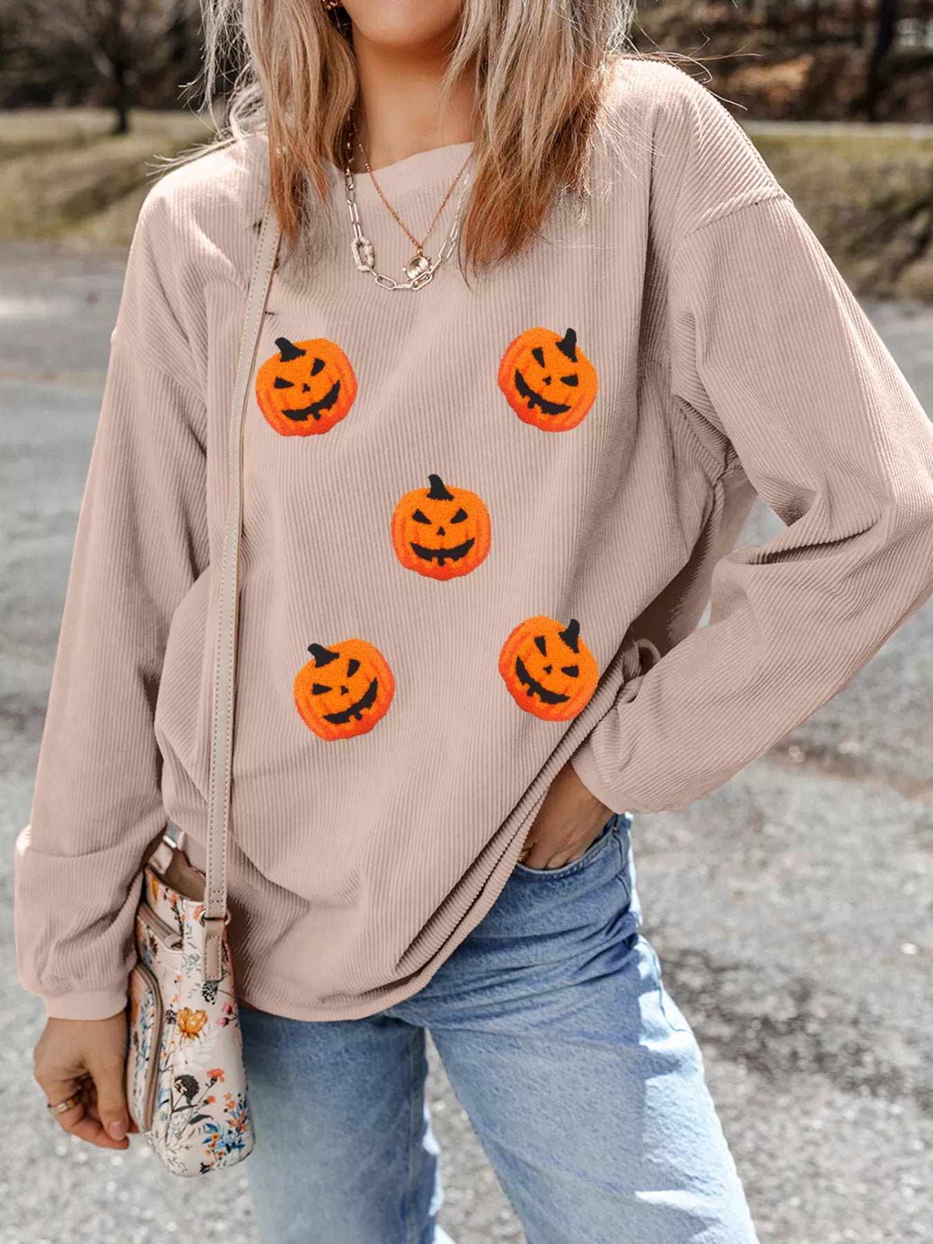 Casual Halloween pumpkin drop shoulder sweatshirt with embroidered pumpkins, perfect for festive autumn outfits.