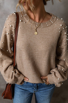 Stylish pearl detail round neck long sleeve sweater in beige, featuring a relaxed fit, perfect for casual outfits.