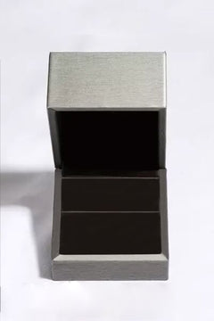 Elegant jewelry box for 2 carat moissanite 925 sterling silver teardrop earrings, featuring a sleek design.