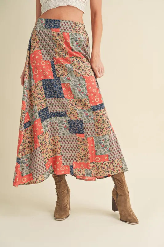 Aemi + Co Printed Maxi Skirt with colorful floral and patchwork design, perfect for summer outfits and versatile styling.