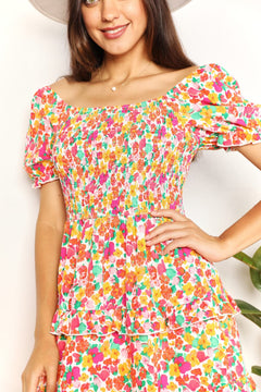 Devine Smocked Sweetheart Neck Flounce Sleeve Mini Dress featuring floral pattern and smocked detailing.