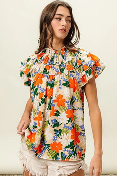 BiBi Multi Color Floral Print Woven Top featuring a vibrant floral design and frill details, perfect for summer outfits.