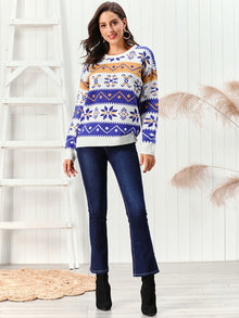 Snowflake Pattern Round Neck Sweater displayed on a model, showcasing its vibrant colors and festive design.