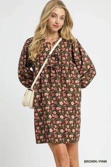 Umgee floral tie-neck babydoll dress in brown and pink, perfect for a charming and feminine look.
