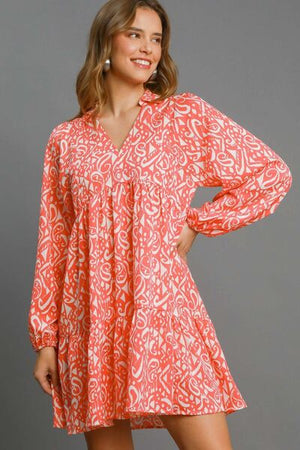 Umgee boho print balloon sleeve tiered dress in orange, featuring a stylish v-neck and playful tiered design.