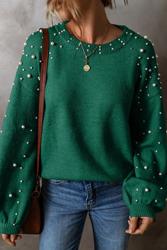 Green round neck long sleeve sweater with pearl details, perfect for casual and stylish outfits.