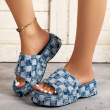Chic plaid platform sandals in blue denim with frayed edges, perfect for stylish comfort in any setting.
