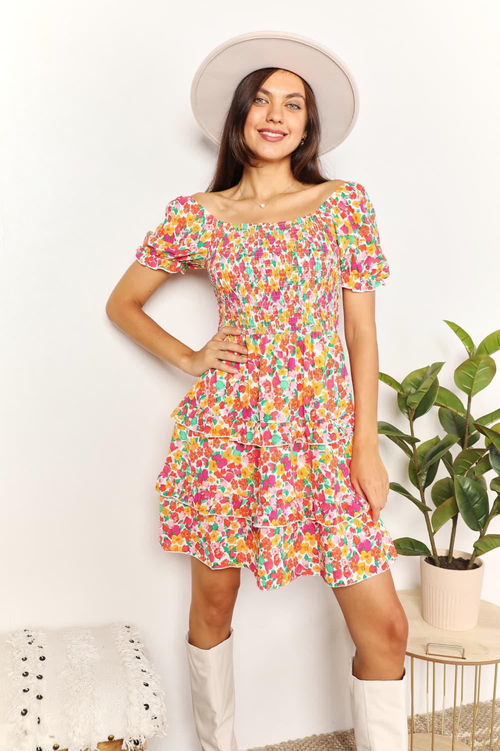 Devine Smocked Sweetheart Neck Flounce Sleeve Mini Dress with colorful floral pattern and playful flounce sleeves.