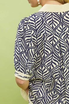 Umgee Geometric Leaf Print Popover Top featuring a stylish leaf motif and gathered cuffs for a relaxed look.