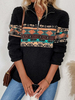 Stylish quarter zip geometric long sleeve sweatshirt with vibrant patterns and cozy fabric, perfect for casual wear.