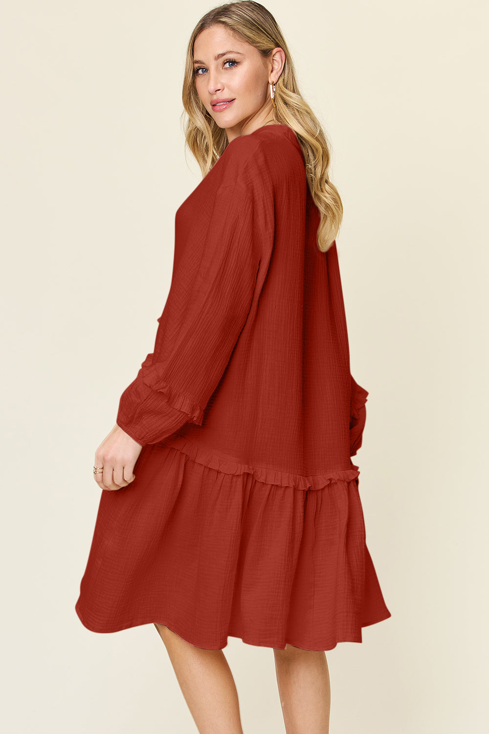 Embrace elegance with the Double Take Dress's unique texture & ruffle trim. 100% cotton comfort meets style. Shop now for a flattering fit!