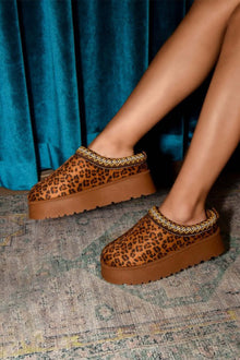 WILD DIVA leopard print platform boots with embroidered trim, stylish footwear perfect for adding flair to any outfit.