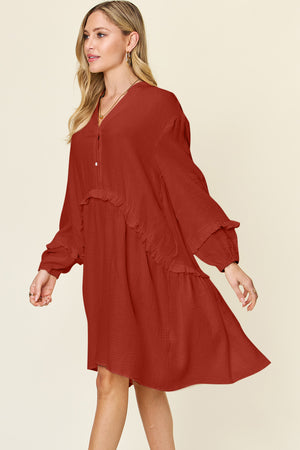 Embrace elegance with the Double Take Dress's unique texture & ruffle trim. 100% cotton comfort meets style. Shop now for a flattering fit!