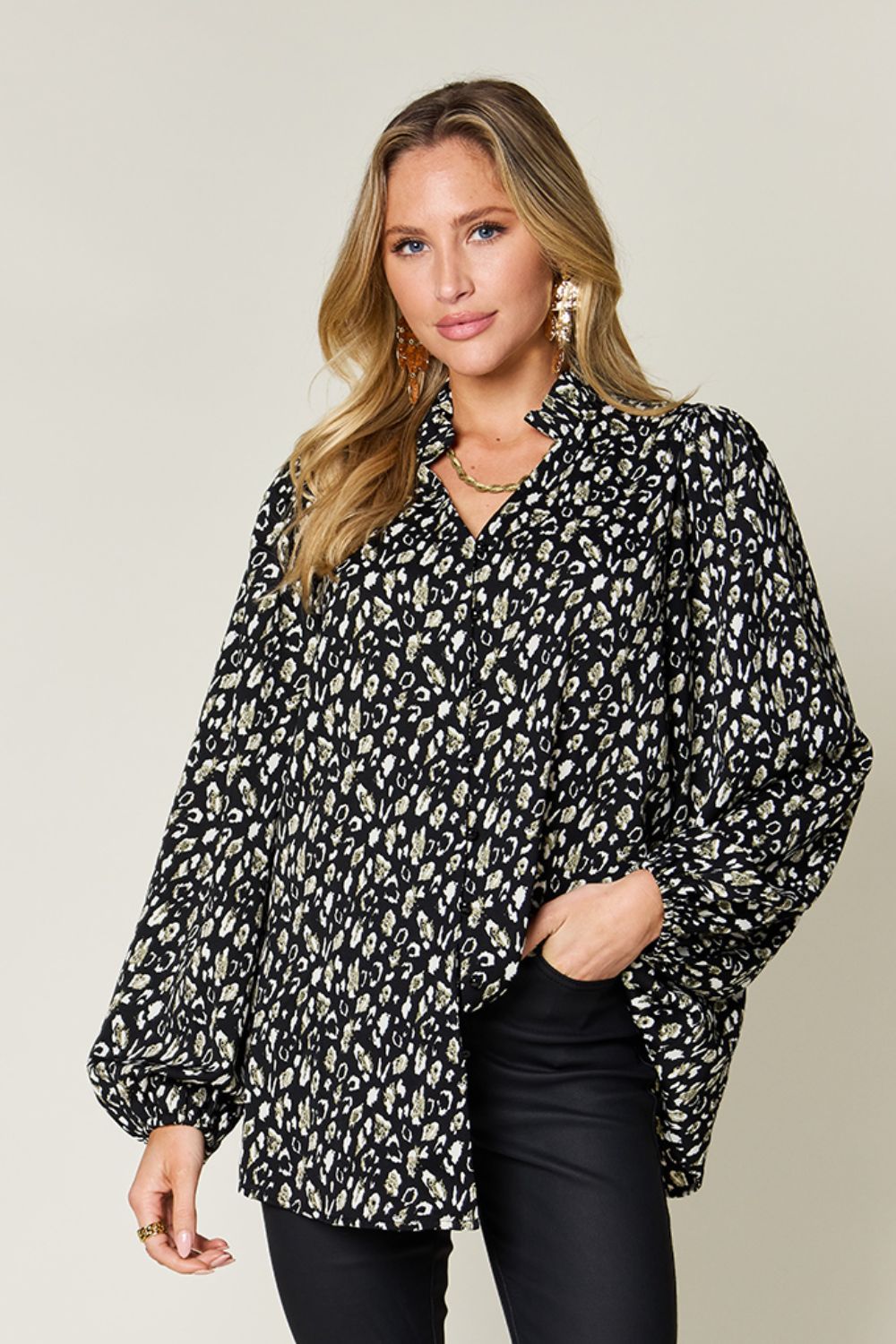 Double Take leopard long sleeve blouse with frill sheer detail, model wearing, stylish and chic, perfect for casual occasions.