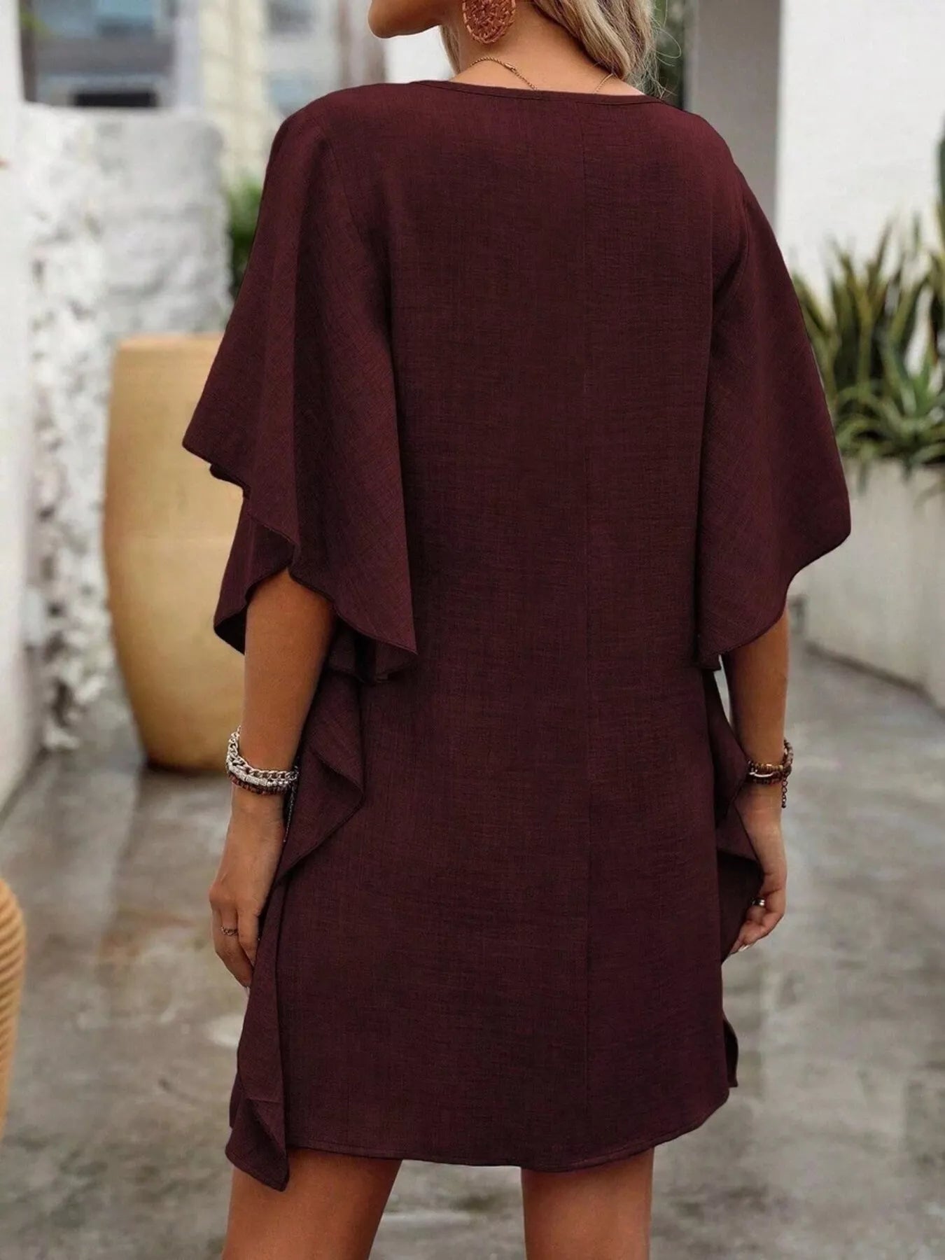 Ruffled Flutter Sleeve V-Neck Mini Dress in burgundy, showcasing a stylish back view with flutter sleeves.