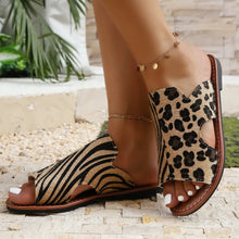 Stylish open toe flats sandals featuring leopard and zebra prints, perfect for casual summer outfits.